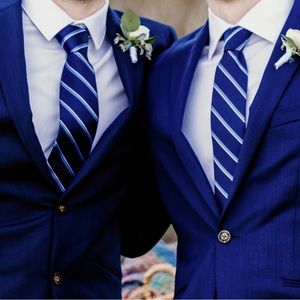 Selling BRAND NEW navy blue TOMMY HILFIGER ties. Unopened; still in package.